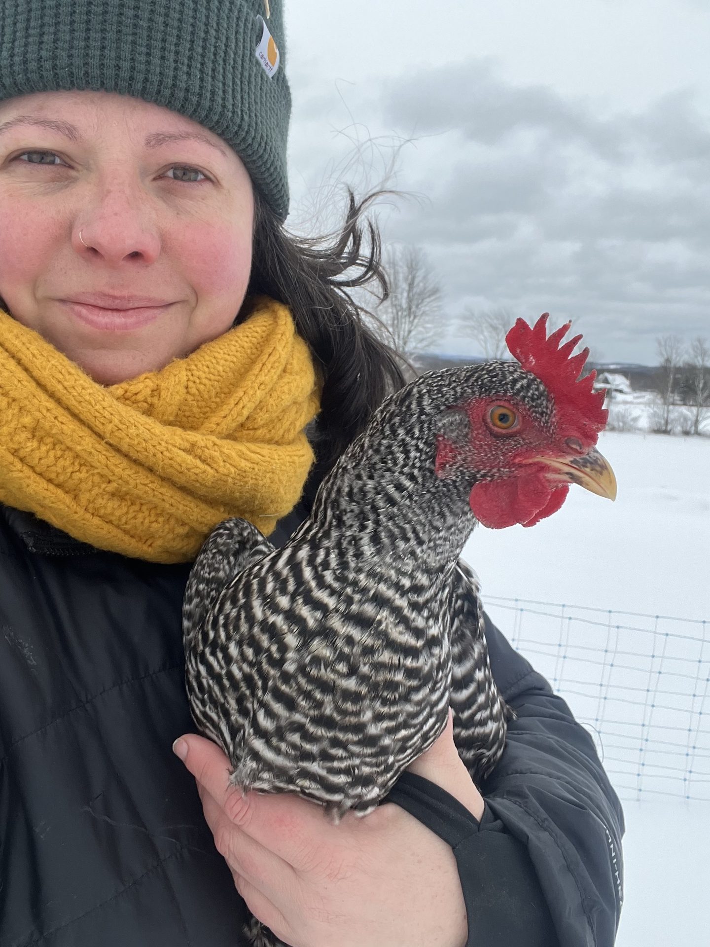 Dana with a chicken